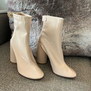 Excellent condition. Nude shiny booties.